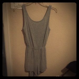 A Xs romper in gray
